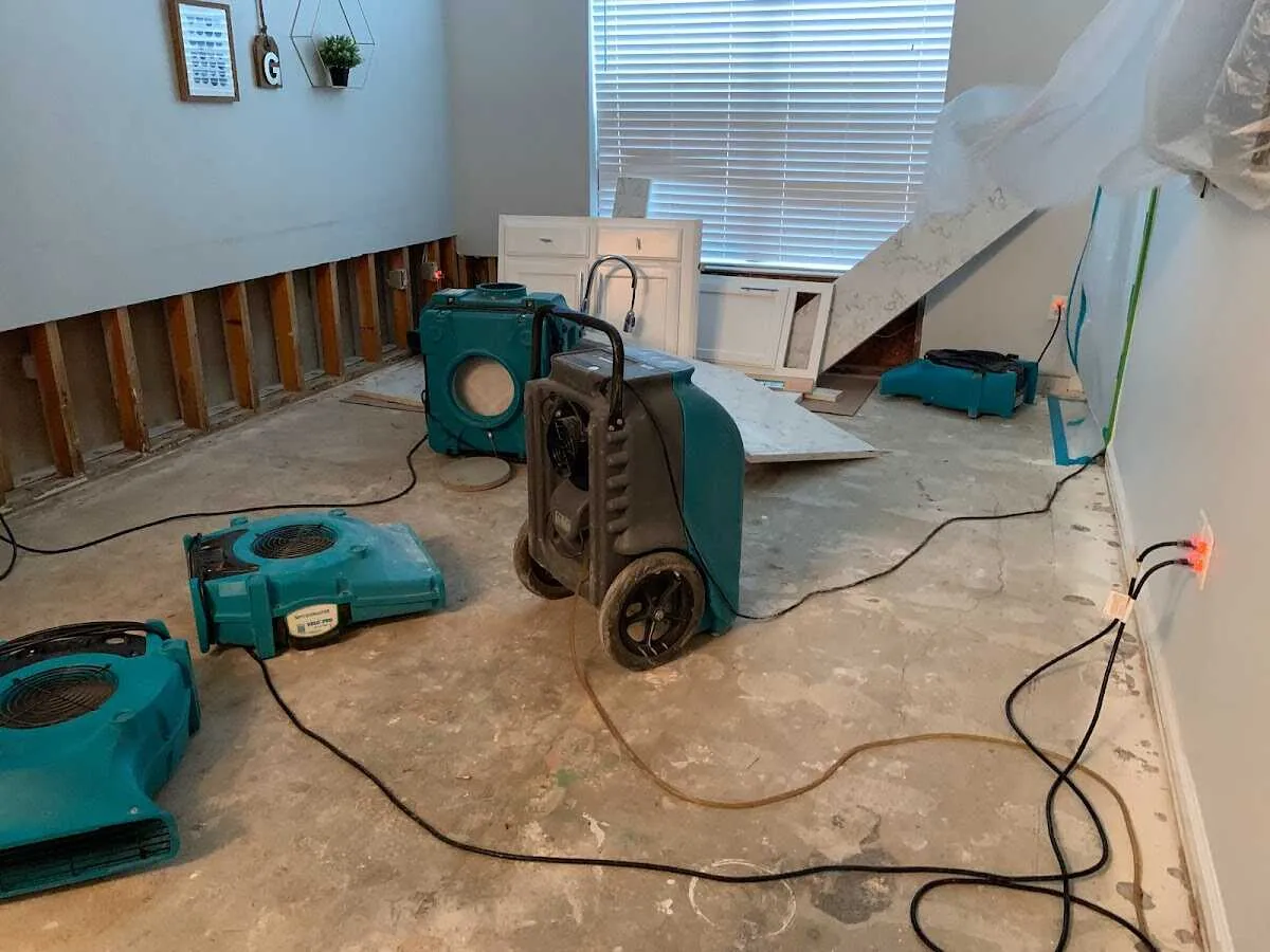 Dehumidifier in flood-cut room for Water Damage Restoration in Chenango